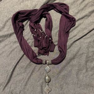 Never worn scarf with metal pieces.